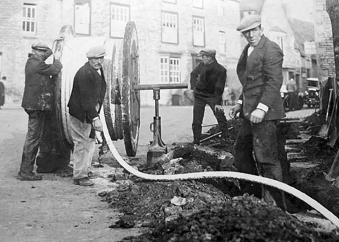 Workmen on West Street, Oundle 1930